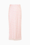 Castle silk-blend floral maxi skirt in blush pink with lace-trim hem, laid flat