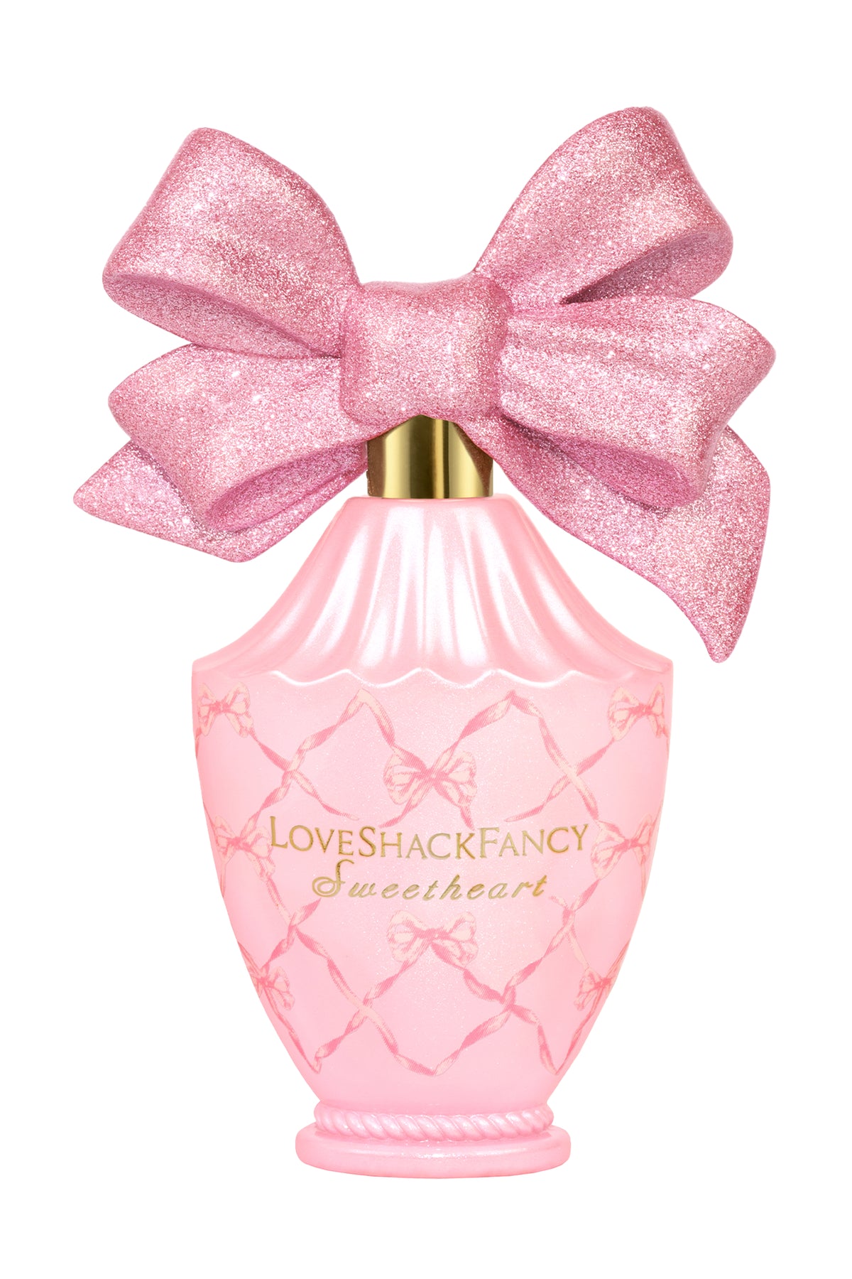 LoveShackFancy Sweetheart pink eau de parfum bottle with glitter bow, pink glass, gold neck