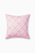 Pink quilted throw pillow with diamond lattice pattern and piped edges