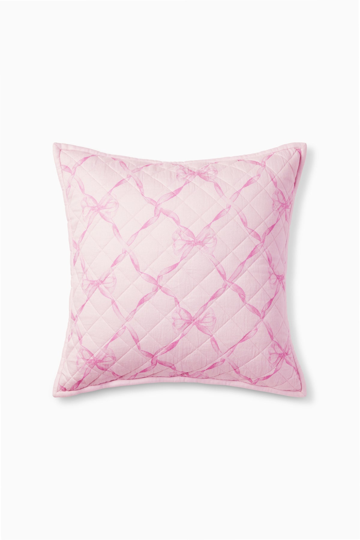 Pink quilted throw pillow with diamond lattice pattern and piped edges