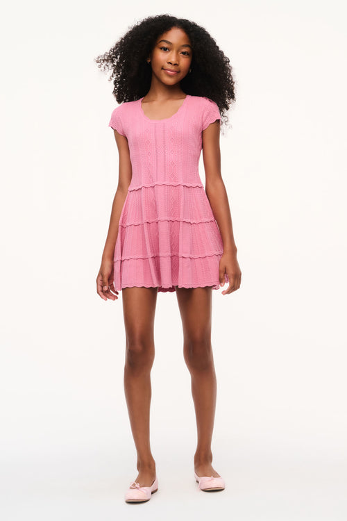 Pink pointelle knit tiered mini dress with cap sleeves, crew neckline, and ruffle layers