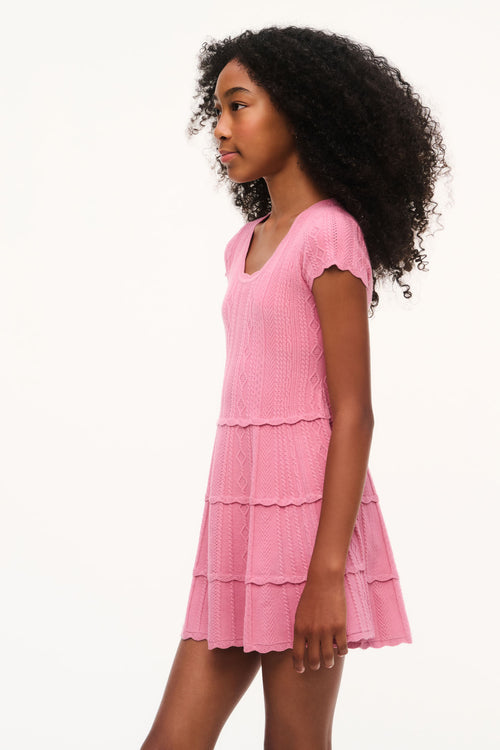 Pink pointelle knit tiered mini dress with cap sleeves and layered ruffle hem