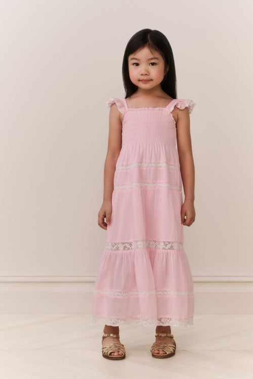 Girls' pink cotton maxi dress with smocked bodice and lace-trim ruffle tiers