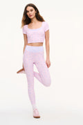 Lilac mixed-print active crop top with scoop neck and short sleeves