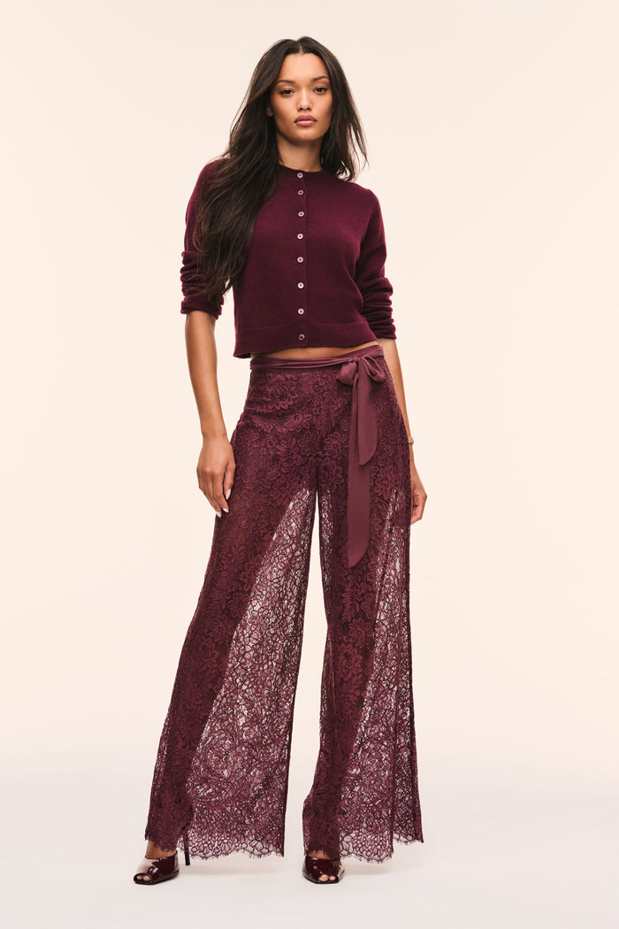 Faded merlot lace wide-leg pants with tie waist and scalloped lace edging at hem.