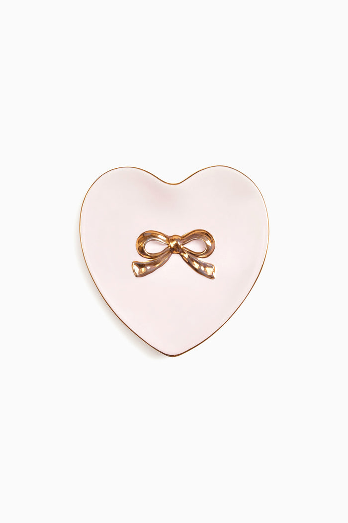 Heart-shaped ring dish with gold bow and smooth PROPER PINK finish