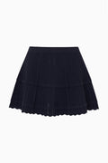 Dark pointelle mini skirt with tiered ruffle hem and wide elastic waistband