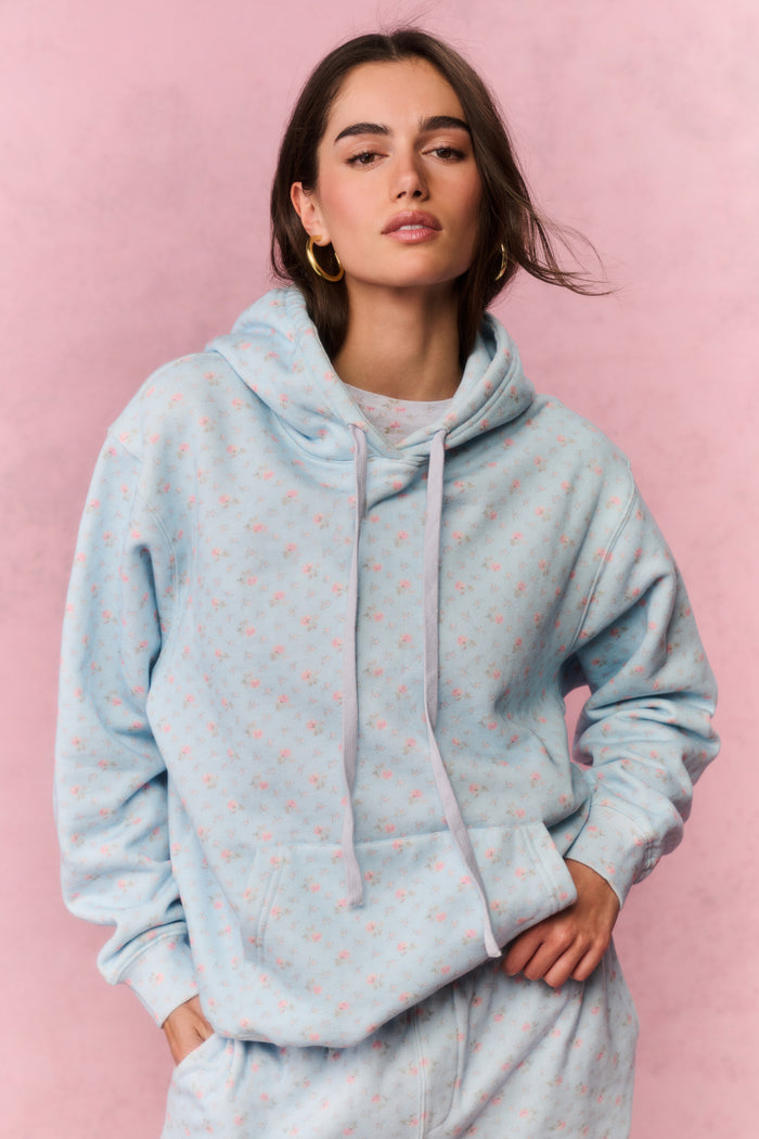 Light blue cotton hoodie with speckle print, pullover hood and front kangaroo pocket