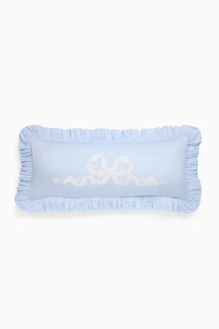 Light blue lumbar pillow with ruffled border and white floral motif