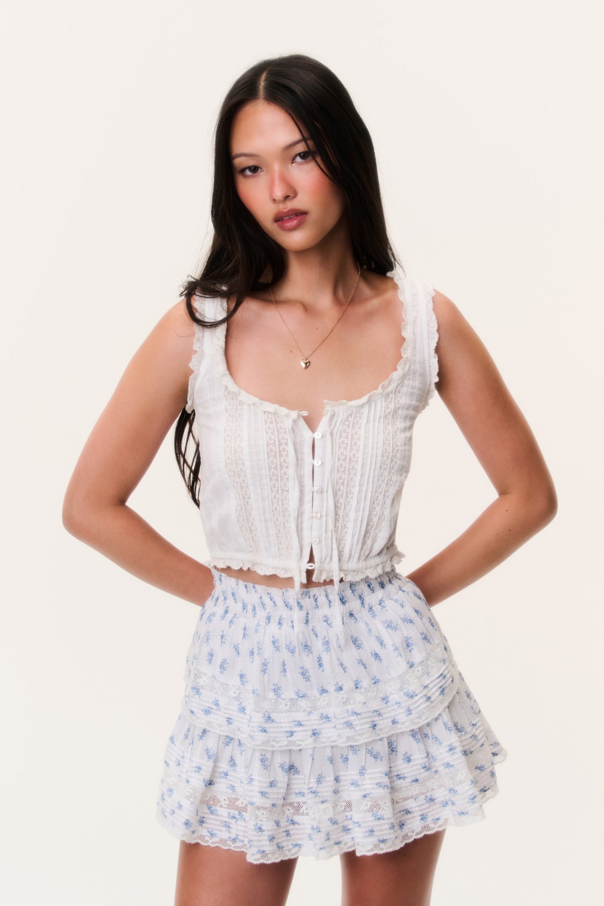 Blue printed ruffle mini skirt with layered tiers and elastic waistband