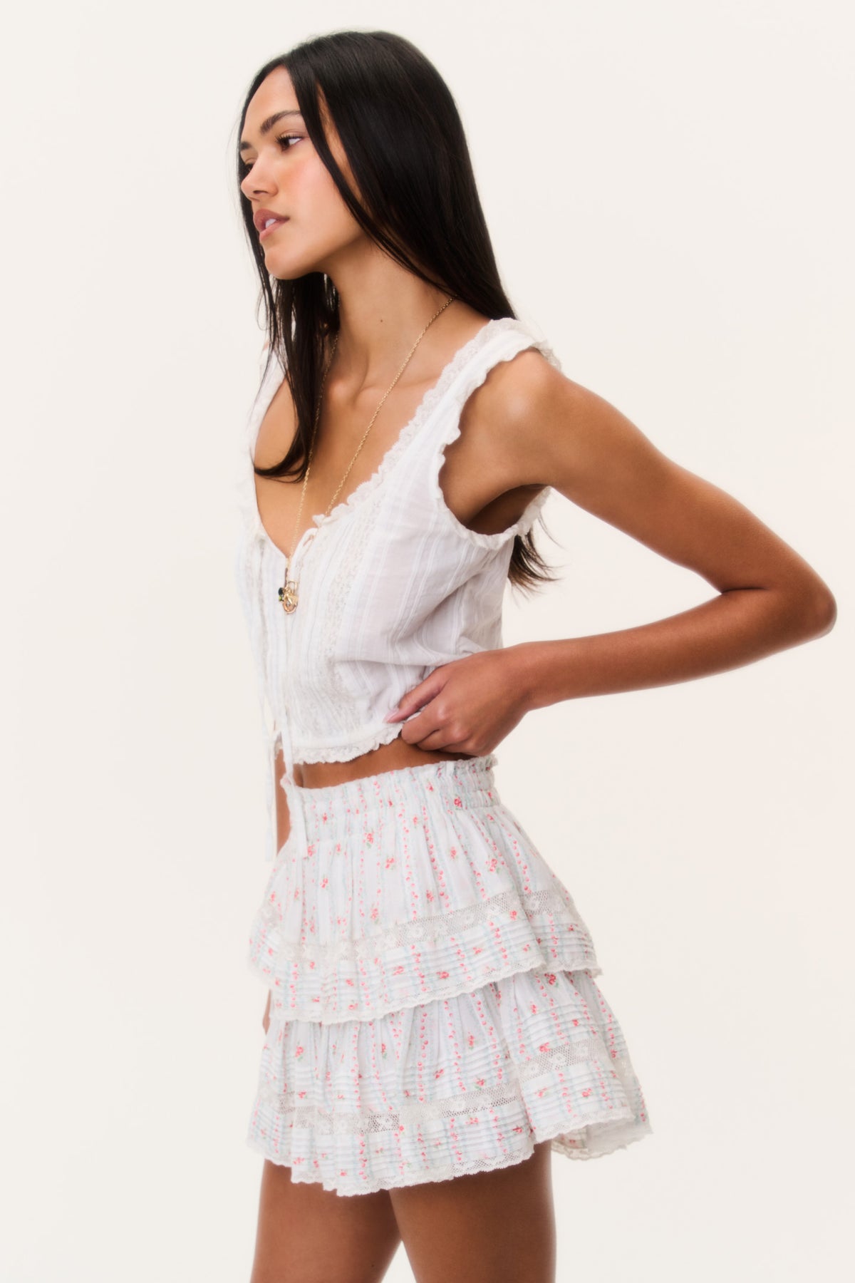 Tiered ruffle mini skirt with red cherry stripe print and gathered waist
