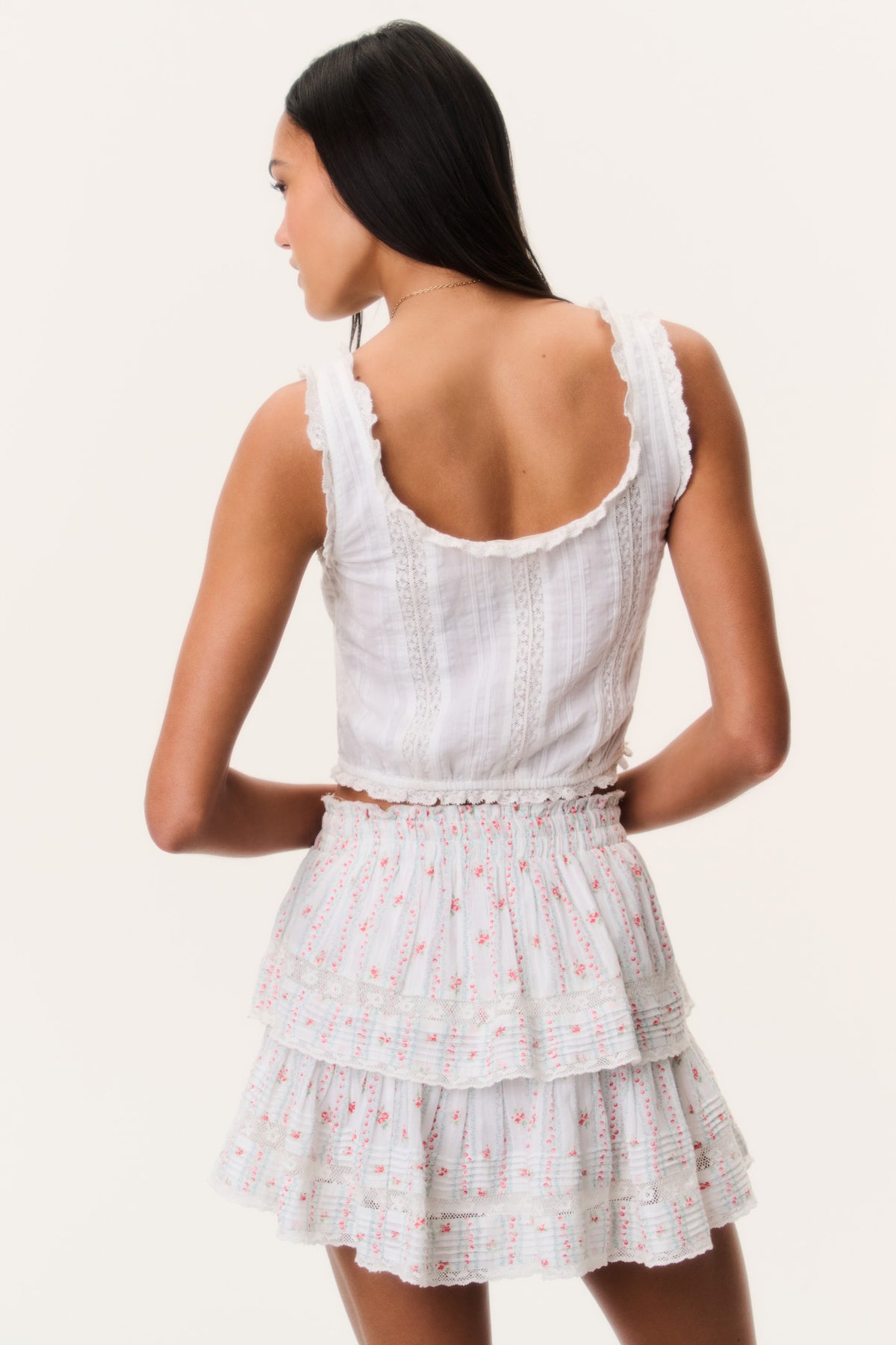 Tiered ruffle mini skirt with red cherry stripe print, back view