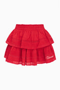 Red tiered ruffle mini skirt with elastic waistband and lace-trimmed hem