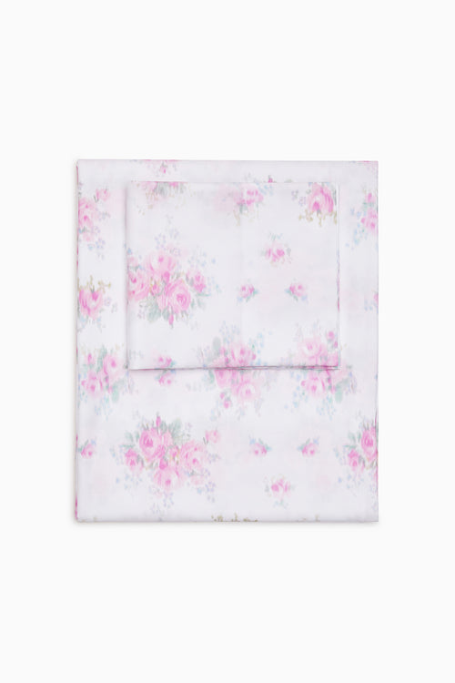 Pink floral sheet set folded flat, includes flat sheet and pillowcases