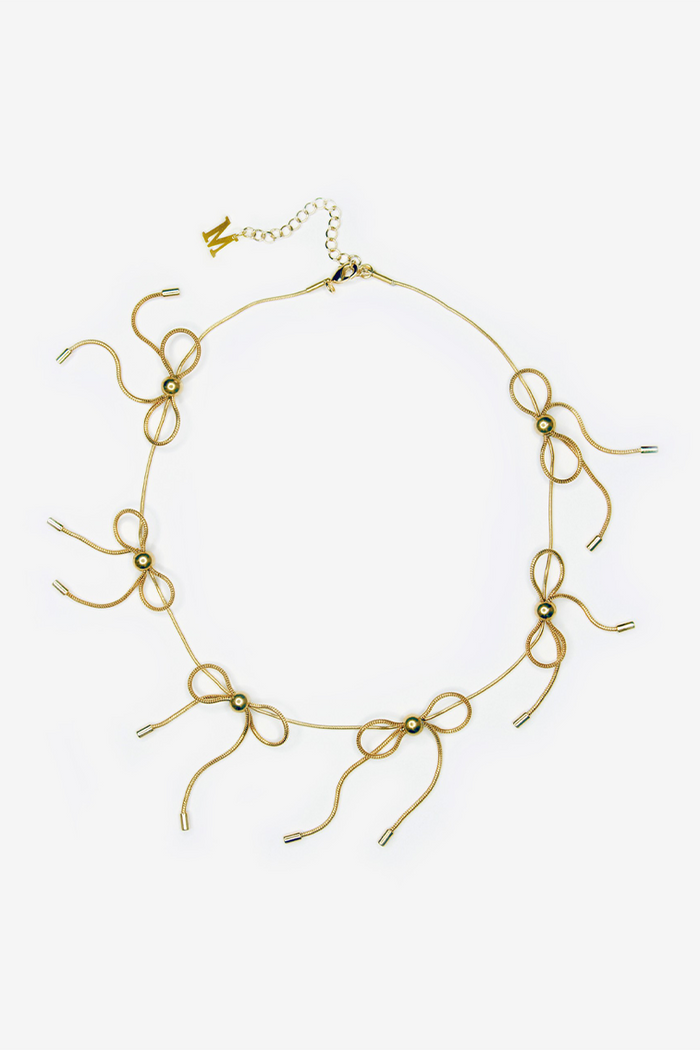 Gold bow necklace with small ribbon bow pendants on a chain