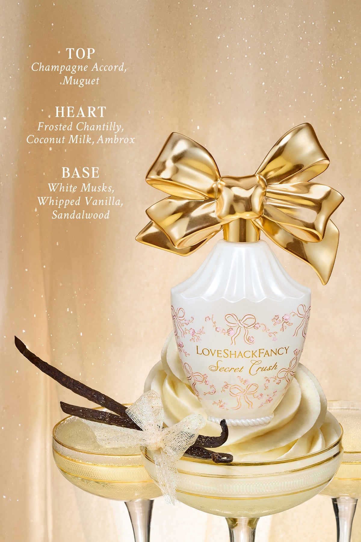 Eau de parfum bottle with gold bow on a stand with scent-notes overlay