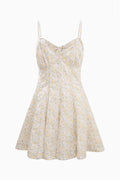 Floral mini sundress with spaghetti straps and flared skirt, gathered waist