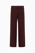 Burgundy knit tween pants with elastic waist, textured cable pattern