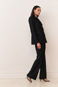 Black wool-blend blazer with notched lapel and bow-trim pocket flap details