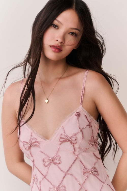 Pink beaded bow mini dress, spaghetti straps, diamond lattice with bow details