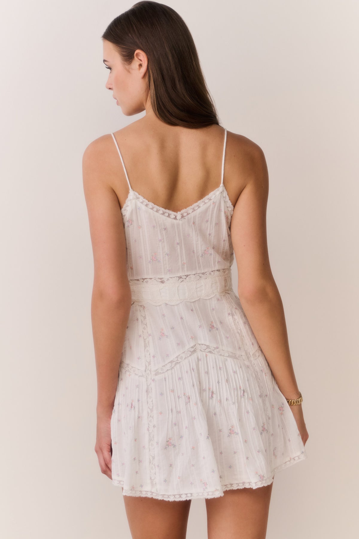 White floral embroidered cotton mini dress with spaghetti straps, open back