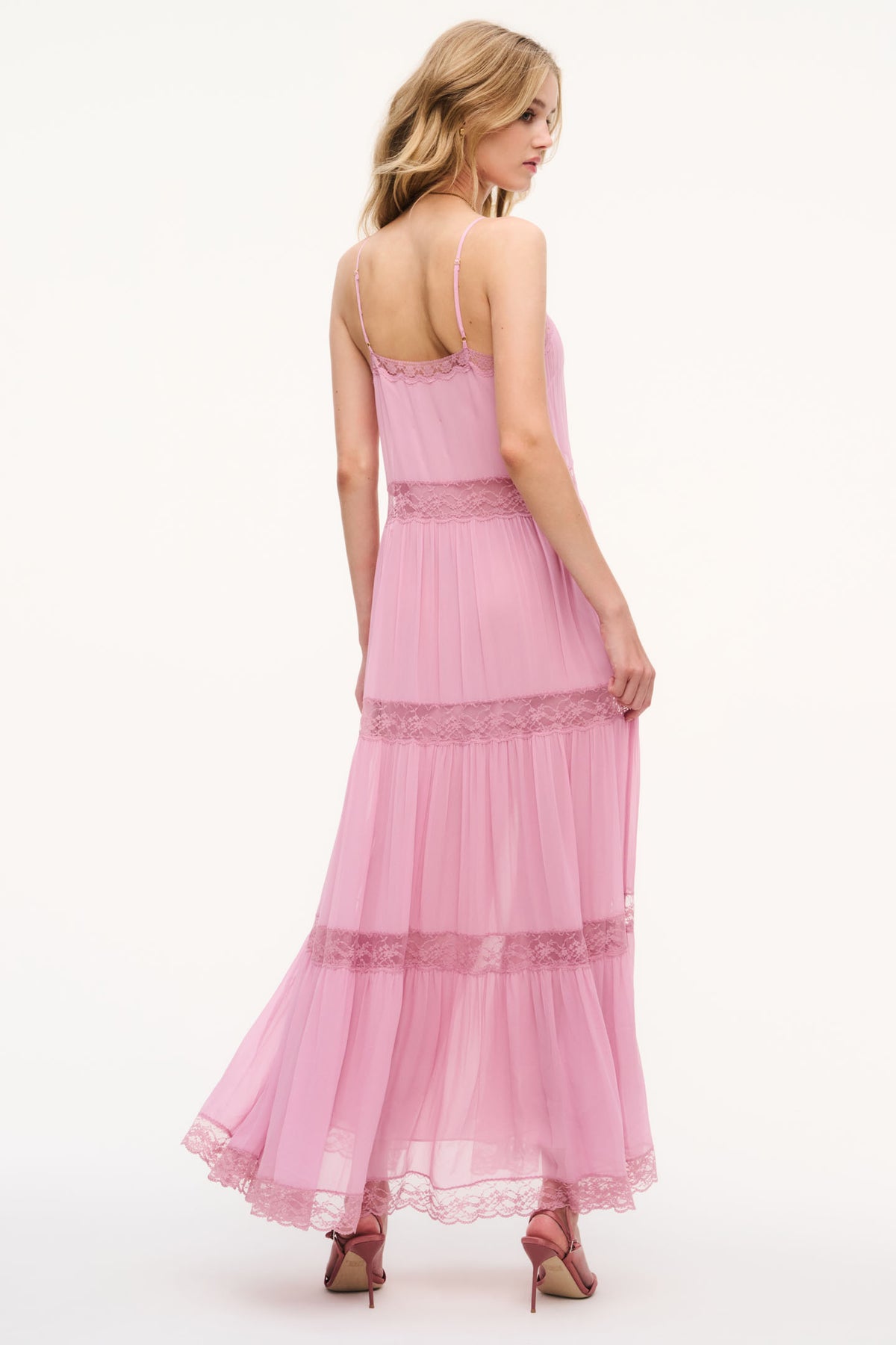 Pink chiffon maxi dress with lace-trim tiers and back spaghetti straps, back view