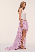 Soft wisteria high-low ruffle skirt with layered frills and draped side hem.