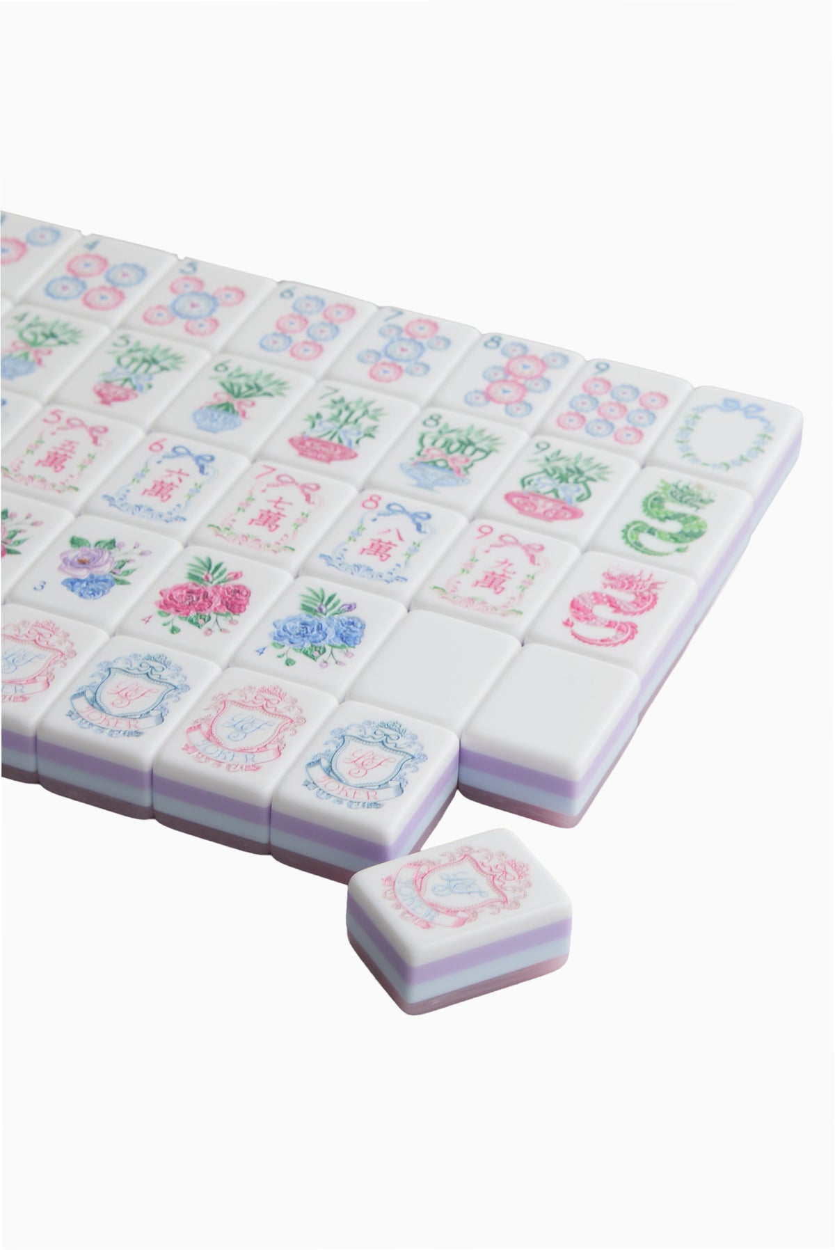 Mahjong tile set with pastel tiles and colorful floral illustrations, laid out