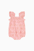 Pink floral baby pinafore with frilled shoulders and gathered skirt front