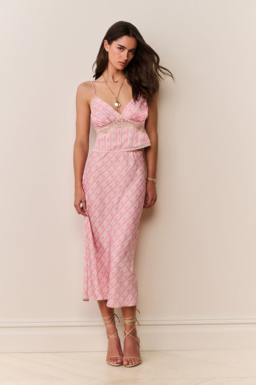 Pink printed midi skirt with elastic waistband and slim straight silhouette