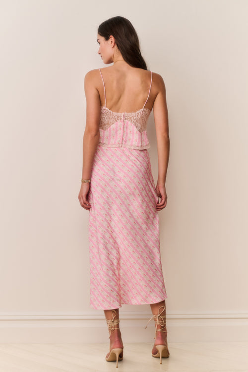 Pink printed midi skirt with wide waistband and visible back seam