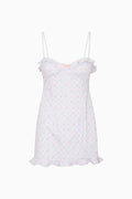 Floral cotton mini dress with spaghetti straps and ruffled neckline trim