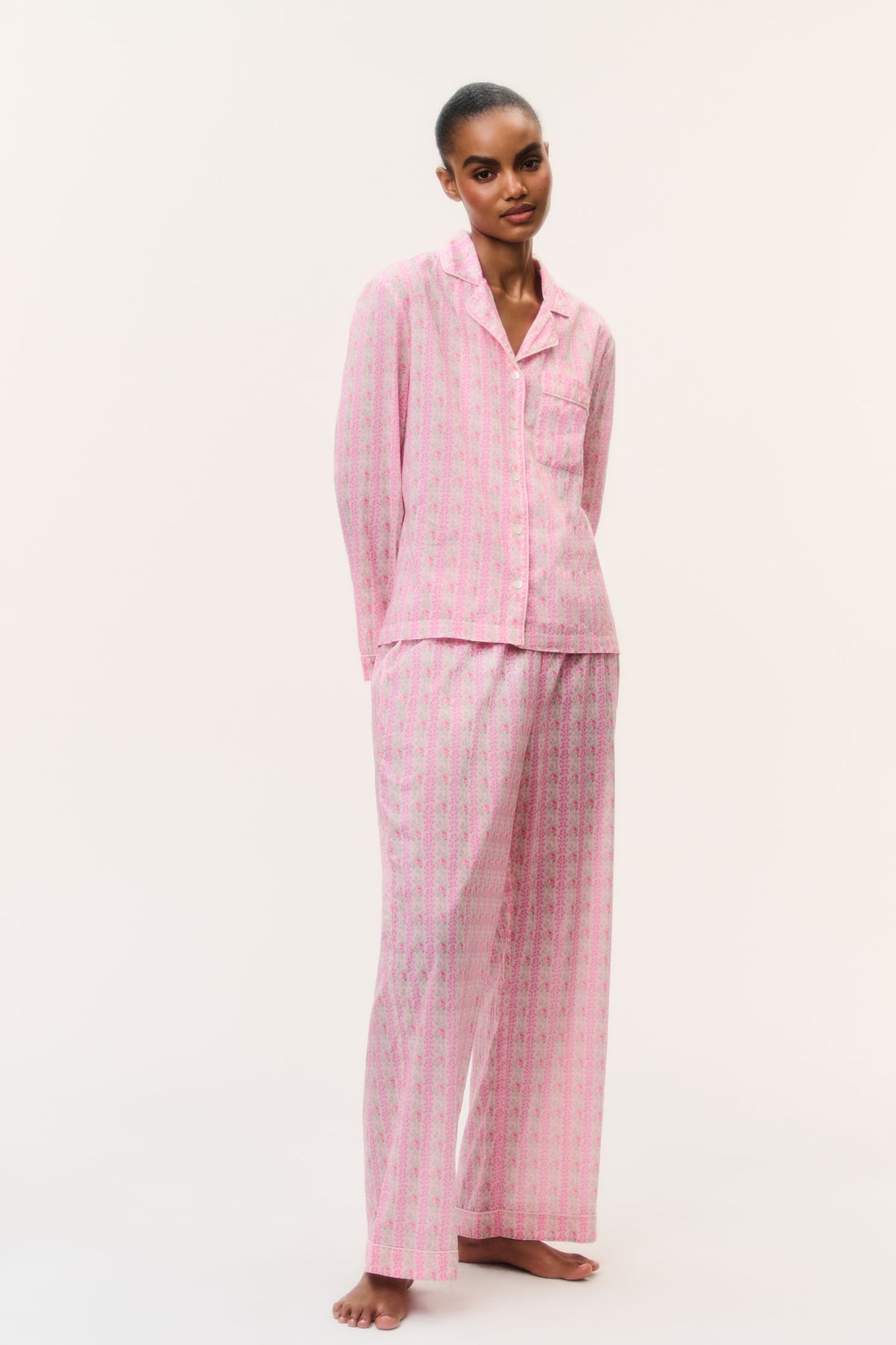 Pink cotton pajama set with button-front shirt and wide-leg pants, small print