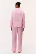Pink cotton pajama set back view: button shirt and wide-leg pants, small print