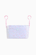 Floral stroller organizer bag with pink top straps and open front panel