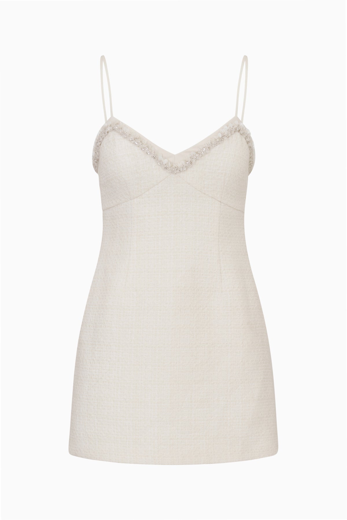 Ivory tweed mini dress on white background with spaghetti straps and lace trim