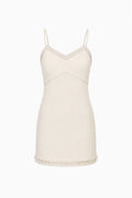 Ivory tweed slip dress with spaghetti straps and scalloped embellished hem