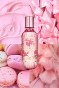 Pink hair and body perfume mist bottle with metallic silver cap, front view