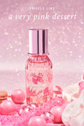 Mini hair and body mist bottle, upright pink floral label, rose-gold cap