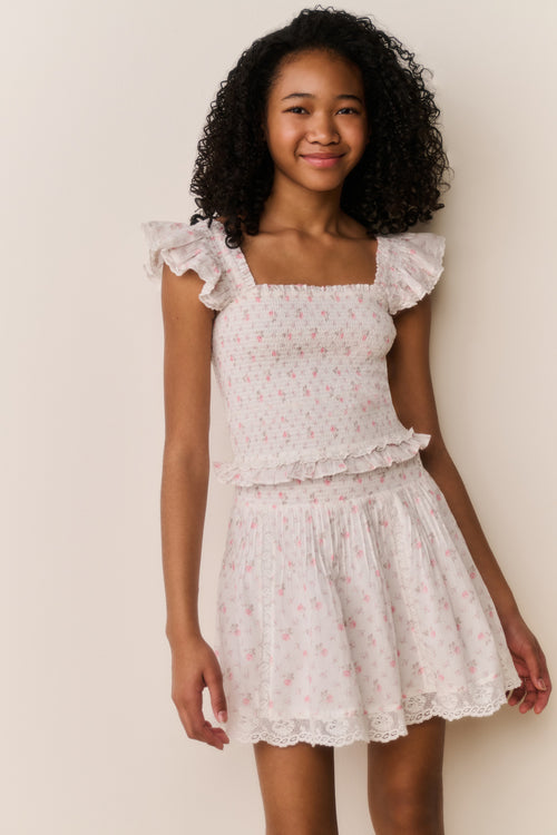 Ivory floral cotton skirt with tiered ruffles and lace-trim hem, front view