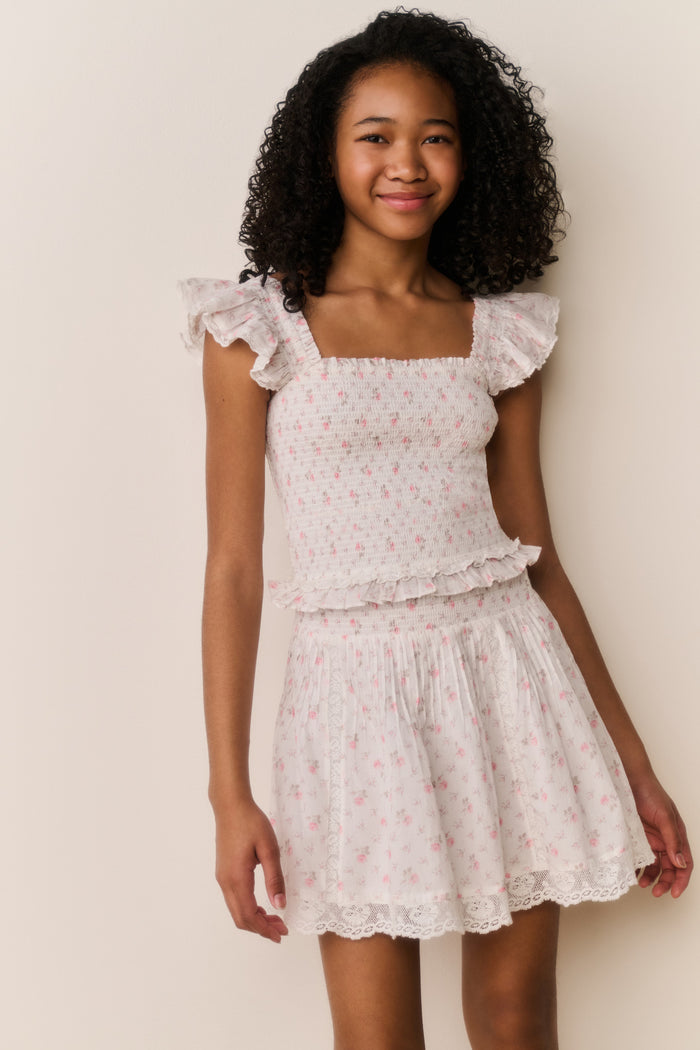 Ivory floral cotton skirt with tiered ruffles and lace-trim hem, front view