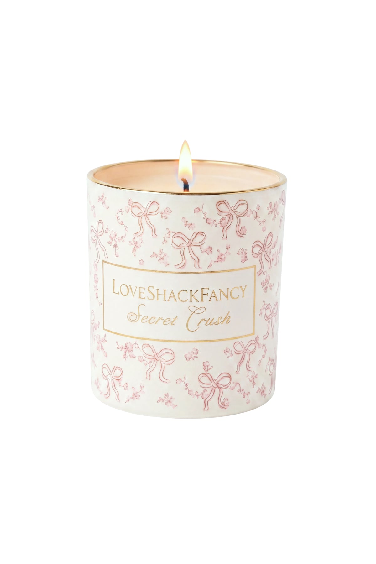 Scented candle in white glass with pink bow pattern and “Secret Crush” label