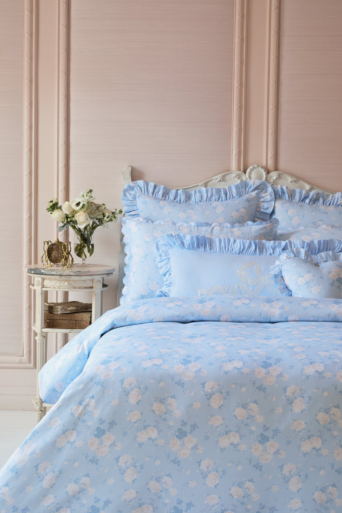 Light blue printed duvet cover with ruffled sham set, floral pattern across bedding