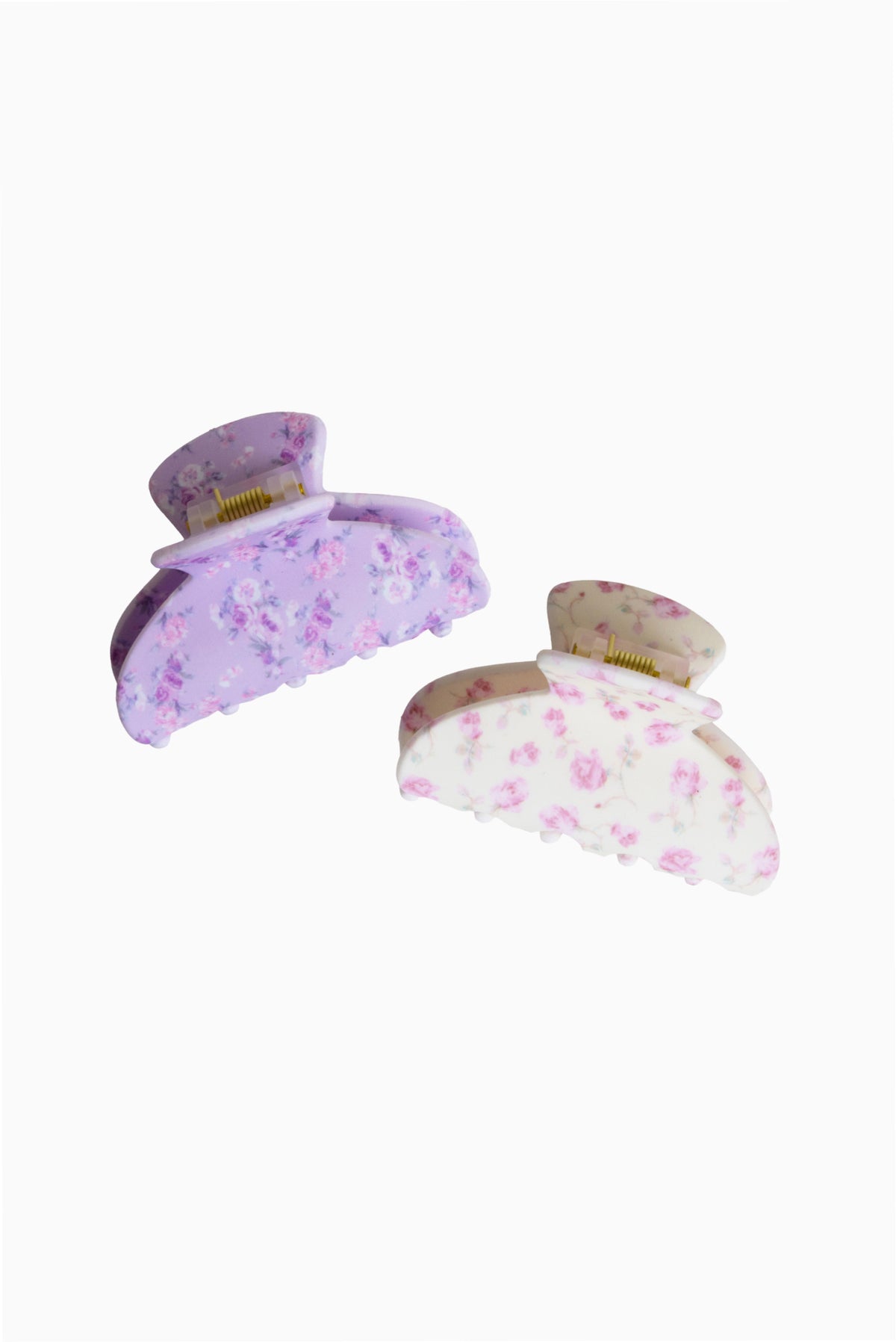 Pair of small claw hair clips with lavender and light-pink floral patterns