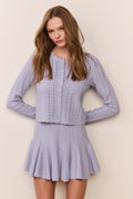 Peridot stretch pointelle cardigan in light lavender, scalloped edge and button front