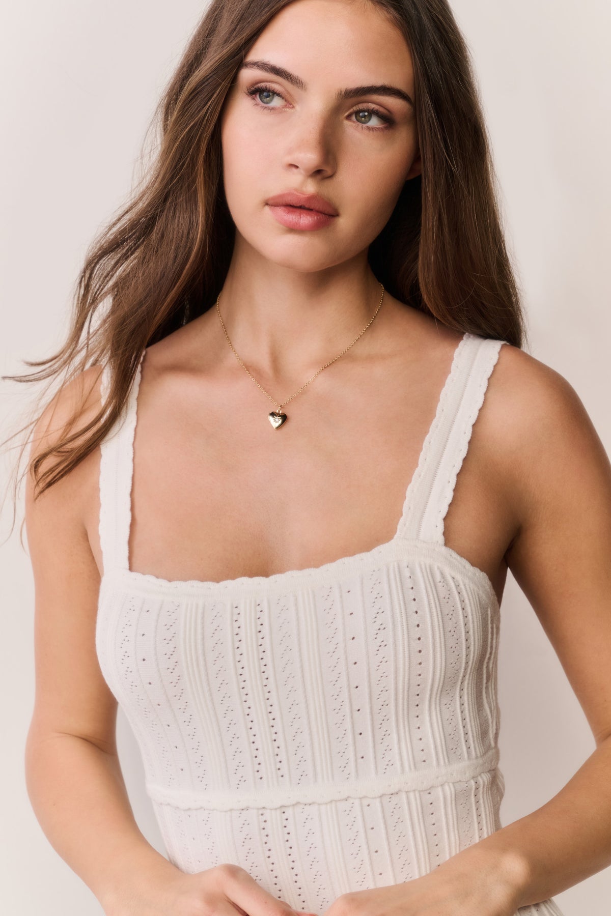 White pointelle mini dress bodice detail with square neckline and thin straps