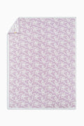 Light purple teddy bow blanket with allover white bow pattern and stitched border