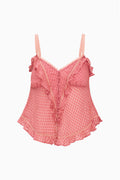 Orchid blush swiss dot silk cami with spaghetti straps and ruffled bodice.