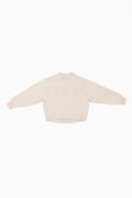 Cream mockneck crew sweatshirt with small pink dotted print at the center