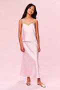 Tween satin maxi skirt in gentle rose pink, smooth drape and long ankle length.